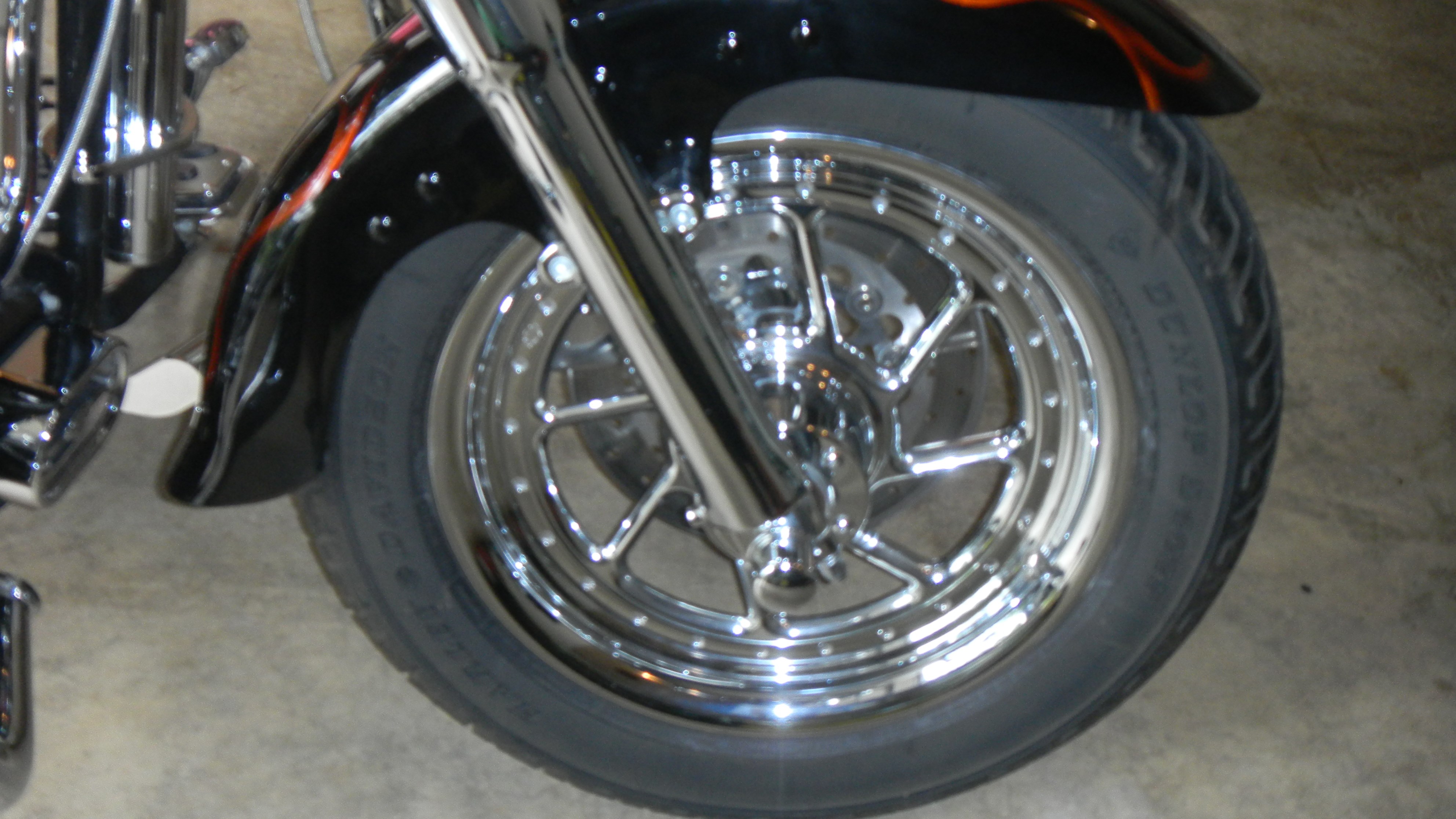 2004 Harley-Davidson® FLSTF/I Softail® Fat Boy® (Black/Orange Flames